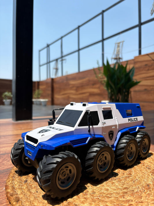 8-Tire RC Police Monster Truck – Off-Road Toy with Flashing Lights & Bold Police Design