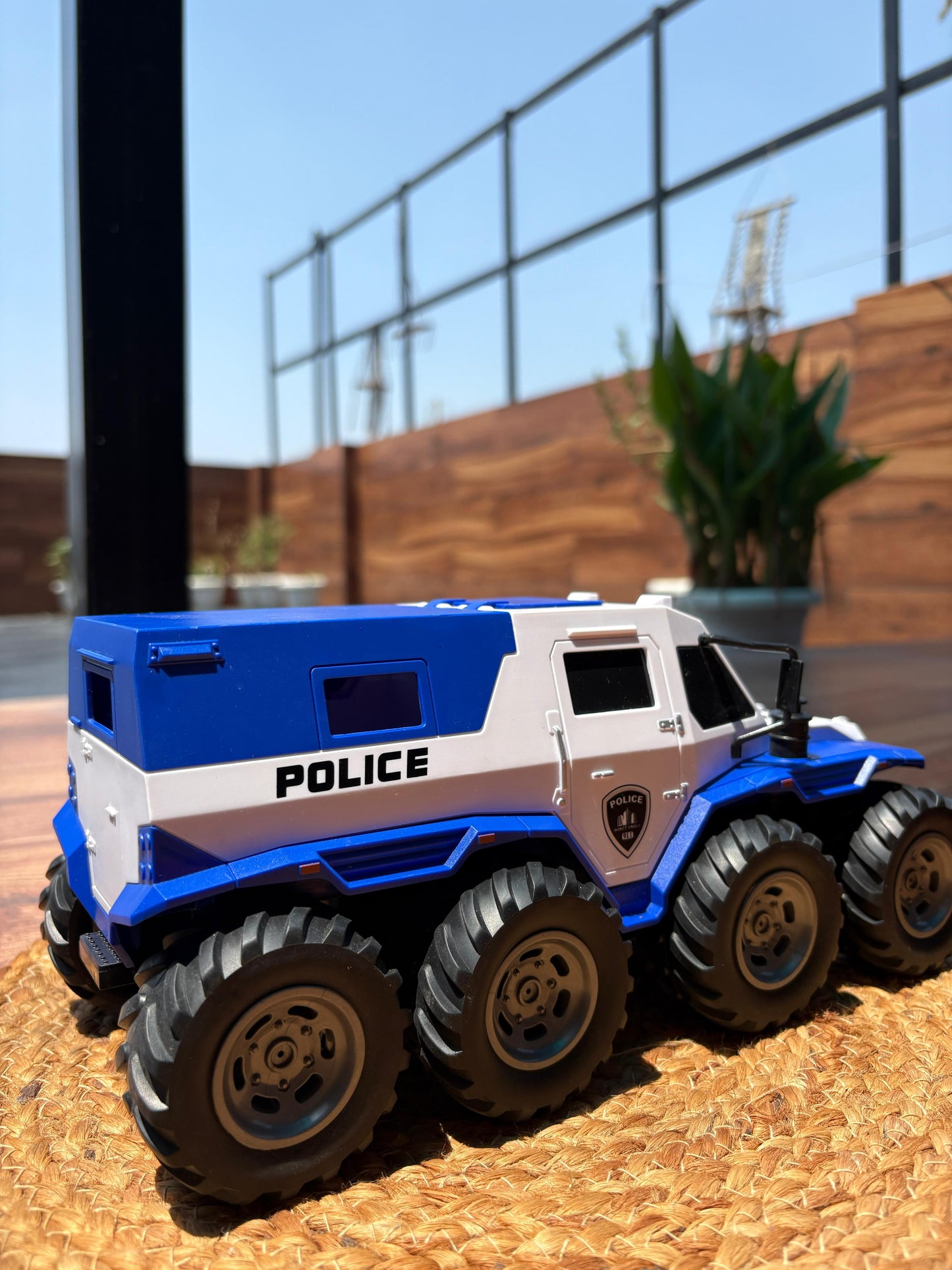 8-Tire RC Police Monster Truck – Off-Road Toy with Flashing Lights & Bold Police Design