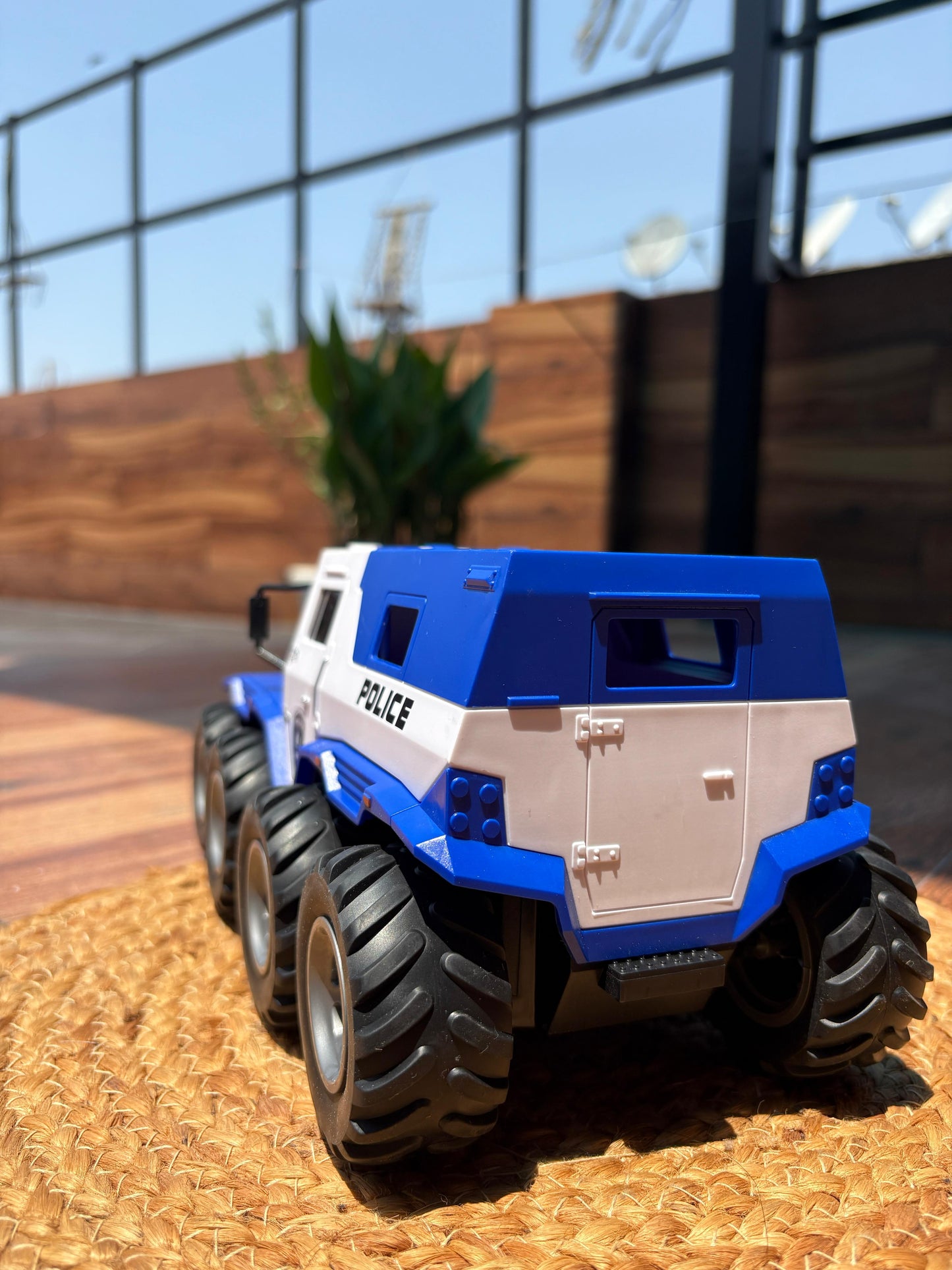 8-Tire RC Police Monster Truck – Off-Road Toy with Flashing Lights & Bold Police Design